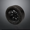 Car Tire With Black Alloy Wheel Rim And Detailed Tread Pattern Design