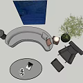 Gray Curved Sofa and Round Coffee Table Set with Blue Art Potted Plant and Lamp