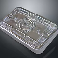 Ornate Engraved Silver Bar With Intricate Central Emblem And Decorative Patterns