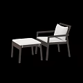 Brown Rattan Leisure Chair With White Cushion And Matching Ottoman