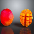 Vibrant Fresh Mango Whole Fruit and Cubed Slices on Dark Background
