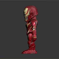 Iron Man Stylized Action Figure With Red Armor And Gold Details Standing On Black Background