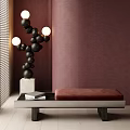 Stylish Maroon Sofa Bench with Black Spherical Lamp Books and Blinds Against Textured Wall