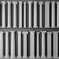 Decorative White Roman Columns Arranged To Display Various Architectural Styles Against Blue Background