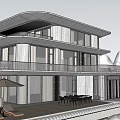 Modern Detached Villa With Large Glass Windows Balcony And Outdoor Seating Area