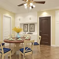 Warm Restaurant Interior With Round Dining Table Blue Seats White Cabinets And Yellow Flowers