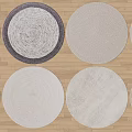 Round Area Rugs with Various Textures and Designs on Wooden Floor