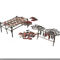 Metal Clothes Drying Racks With Red Fabric And Scattered Cloth Pieces