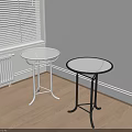 Modern Glass Top Side Tables With Silver And Black Metal Frames In Indoor Corner