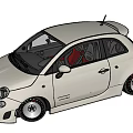 Olive Green Sporty Small Car With Custom Alloy Wheels In Motion