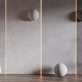 Textured Gray Wall with Vertical Light Strips Circular Decor Floor Spheres and Side Plant