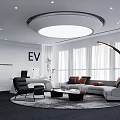Modern Office Interior Featuring EV Logo Sofa Armchair Large Windows Arc Floor Lamp Round Rug