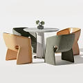 Modern Round Table With Four Colored Velvet Chairs In Green Beige And Orange Tones