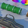 Colorful Household Supplies With Rainbow Umbrellas Various Colored Vehicles Rolled Items And Small Tools