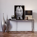 Decorative Ornament Set With Silver Vase Globe Black White Portrait Table Lamp On Metal Table