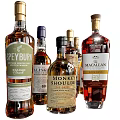 Various Premium Whiskey Brands Bottles Display With Speyburn Talisker And Macallan Labels