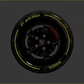 P ZERO Tire Featuring Green Accent Lines Metallic Wheel Rim and Red Brake Caliper