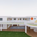 White School Building Featuring Colorful Circular Decor Balcony Rainbow Railings Outdoor Playground Green Lawn Trees