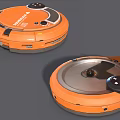 Orange Robot Vacuum Cleaner With Music CDs On Black Surface