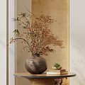 Decorative Vase With Dried Branches And Small Flowers On Round Wooden Table With Traditional Mural