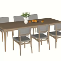 Modern Light Wood Dining Table Set With Six Chairs Vase And Fruits On Top