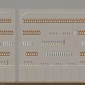 Various Bottles Neatly Arranged On White Shelves In Retail Display Interior