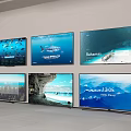 Multiple Modern Televisions Mounted on Wall Displaying Various Ocean Scenes and Time 3d model