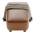 Cozy Brown Leather Stool Topped With Gray Blanket And Sturdy Wooden Legs