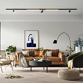 Modern Dining Living Room Interior With Brown Sofa Green Armchair Coffee Table And Decorative Plants