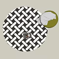 Black and White Round Rug with Braided Shaggy Texture and Green Cushion in Living Room