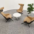 Modern Lounge Area With Brown Black Chairs White Round Table Green Plant And Gray Carpet