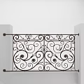 Classic Staircase Featuring Wrought Iron Railings With Intricate Floral Patterns And Dark Wooden Steps