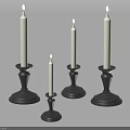 Lit White Decorative Candles On Black Candle Holders With Sturdy Bases For Home Decor