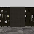 Modern Dark Bookcase With Multiple Compartments Books Decorative Sculptures And Small Plant