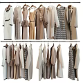 Women's Elegant Clothes Hanging on Racks with Various Styles and Neutral Tones