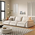 Beige Three Seater Sofa In Modern Living Room With Linen Decorative Wall Art And Plants