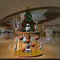Star Top Christmas Decoration In Shopping Mall Lobby With Carousel Base And Reindeer