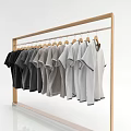 Row of Gray T-shirts Hanging On Wooden Hangers With Gradient Color From Dark To Light