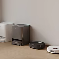 Contemporary Home Floor Appliances In Various Colors Including Upright Units And Robotic Vacuums