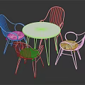 White Round Table With Four Metal Frame Chairs Featuring Colorful Cushions Furniture Set