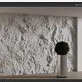 White Textured Background Wall with 3D Relief Design Illuminated by Side Lighting and Silver Planter 3d model