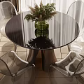 Modern Round Black Glass Table Set with Transparent Chairs and Green Vase Plants