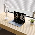 Modern Desk Setup With Laptop Lamp Small Plant And Sunlight Shadows From Blinds