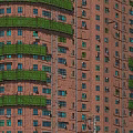 Modern Rural Self Built House With Multi Storey Brick Facade And Green Balconies