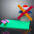 Colorful Building Blocks Windmill With Green Base And Pink Flowers