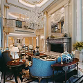 Luxurious Duplex Living Room Interior With Grand Chandelier Fireplace Blue Sofa And Decorative Furniture