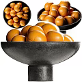 Fresh Ripe Juicy Oranges Arranged in a Black Bowl on White Background