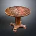 Round Wooden Table with Textured Surface and Vintage Carved Base Design
