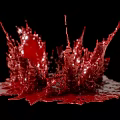 Vibrant Red Crown Shaped Garden Ornament With Splashing Design On Black Background