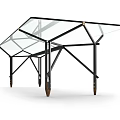 Sleek Glass Top Table With Black Metal Frame And Rolling Wheels Design